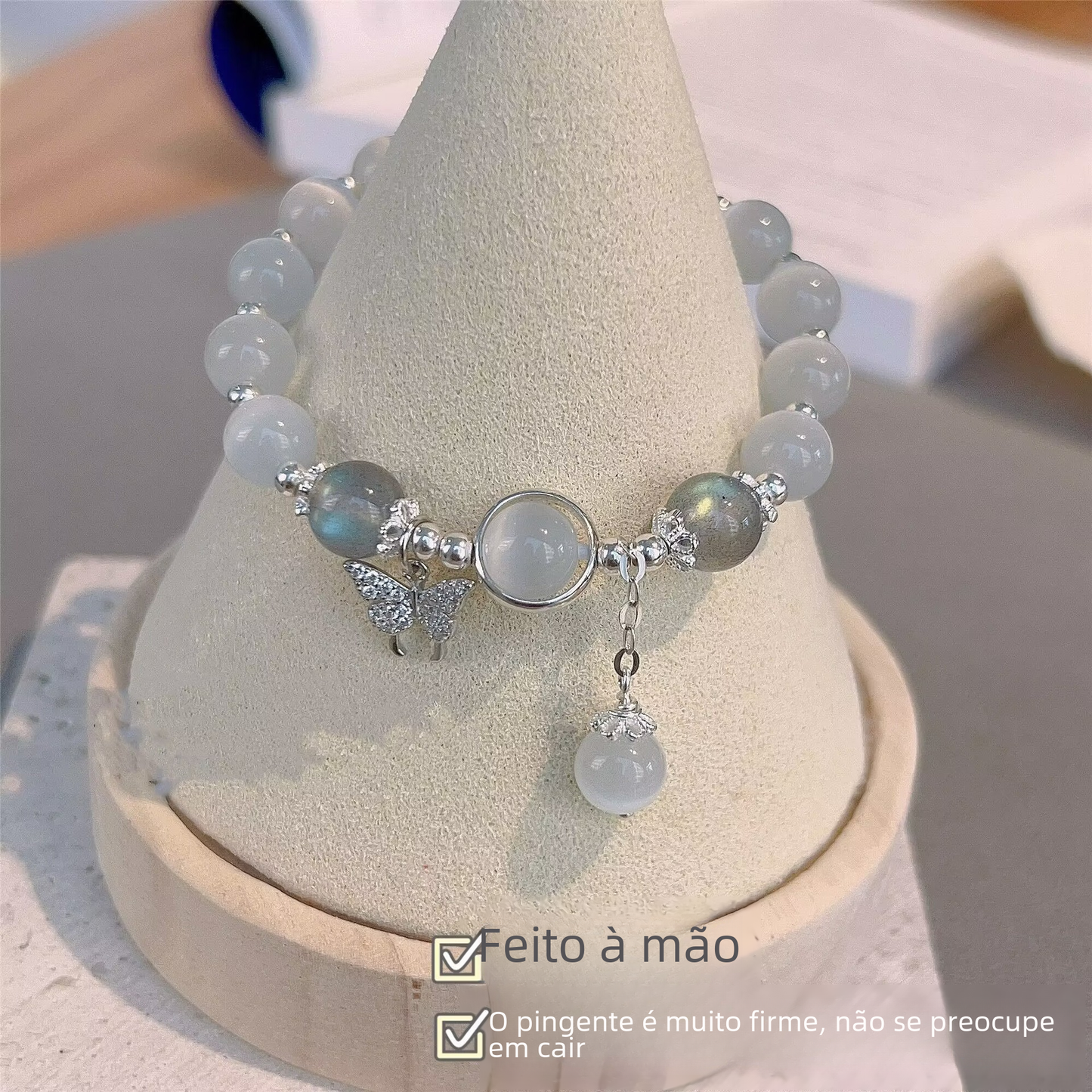 Soft Glow Beaded Bracelet with Butterfly Accent