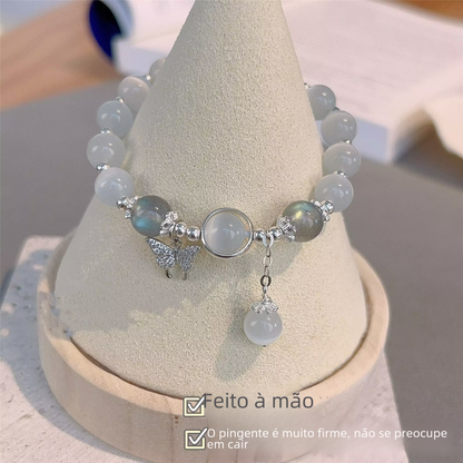 Soft Glow Beaded Bracelet with Butterfly Accent