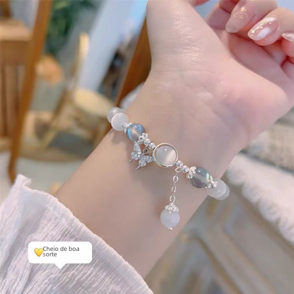 Soft Glow Beaded Bracelet with Butterfly Accent